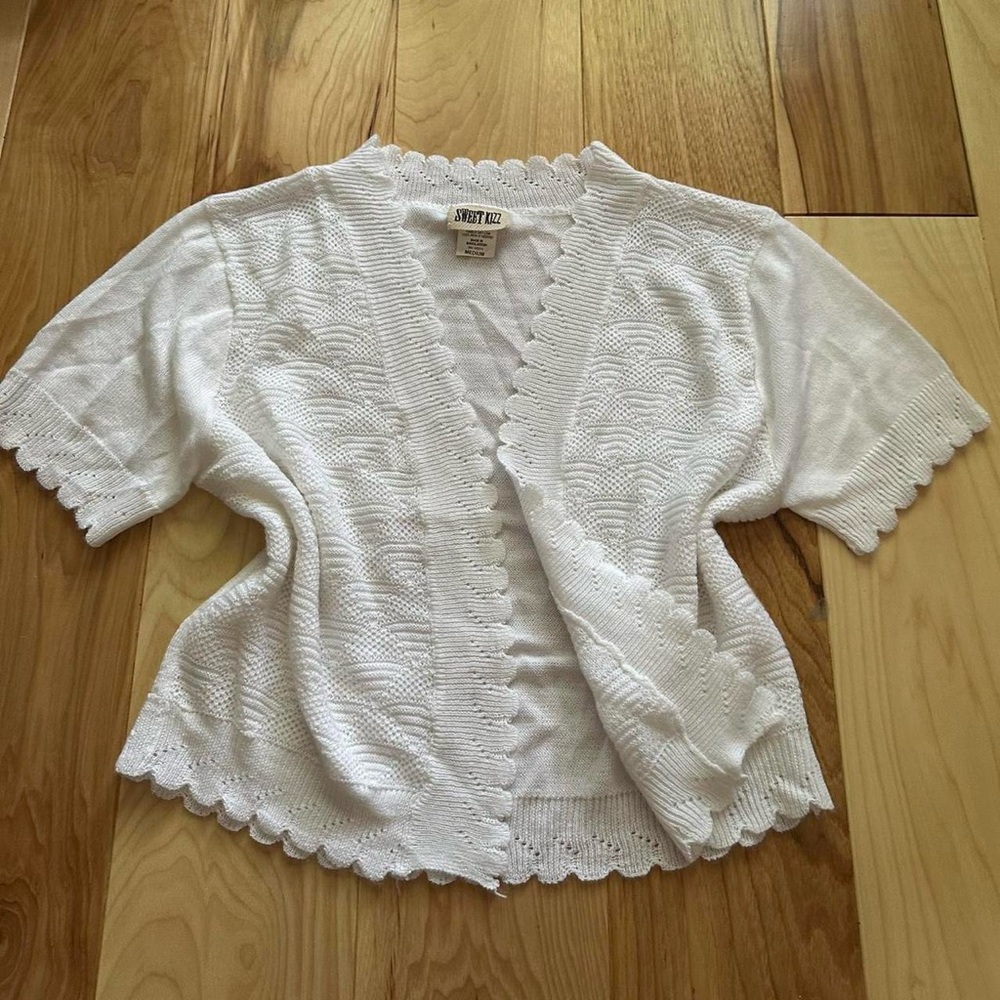white mini cardigan with scallop trim